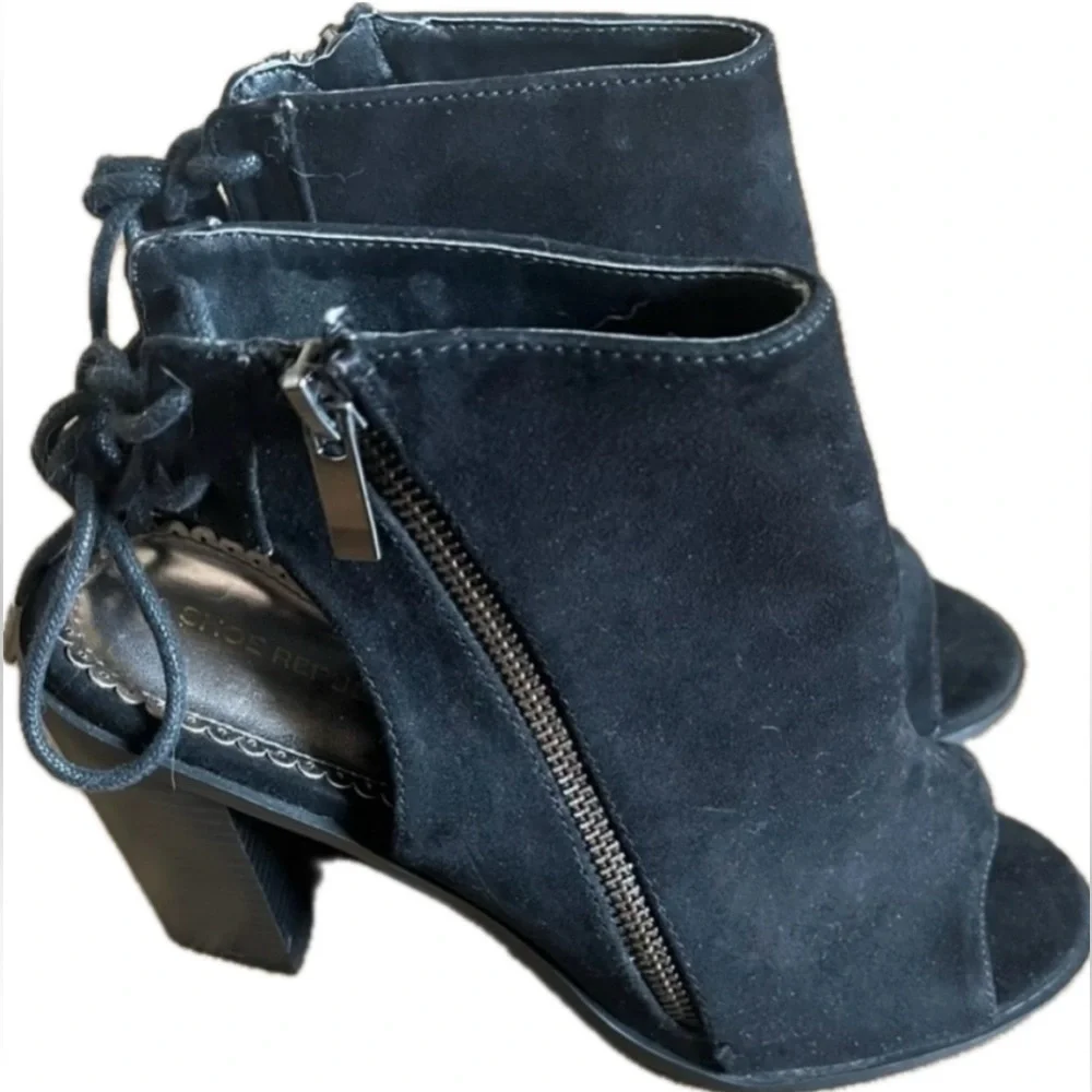 Black Peep Toe Booties with side zipper and chunky heel. NWOT. Women’s size 8.5